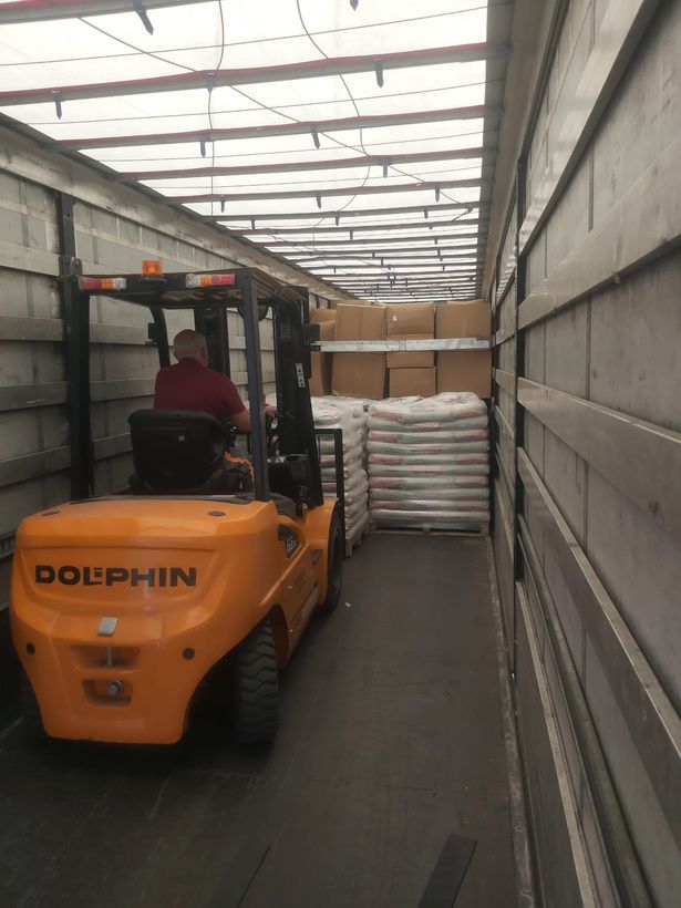 Wrapped pallets of products in the warehouse yard